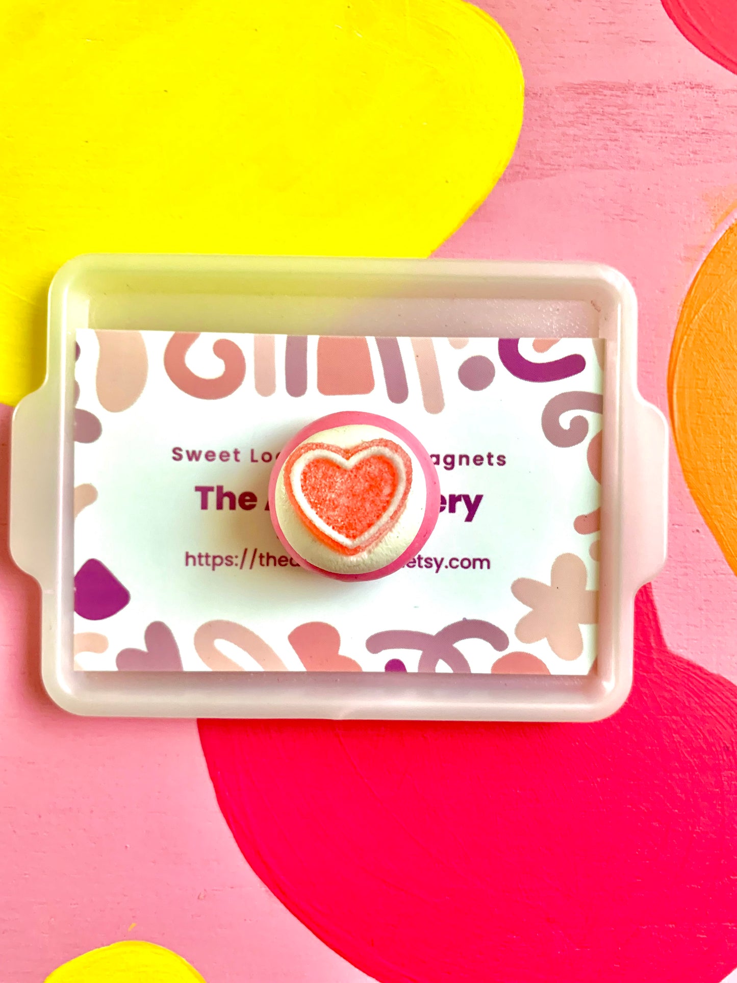 White Icing with Pink Heart Gummy Cookie