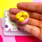 Popcorn with Pink Icing Cookie