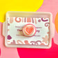 White Icing with Pink Heart Gummy Cookie
